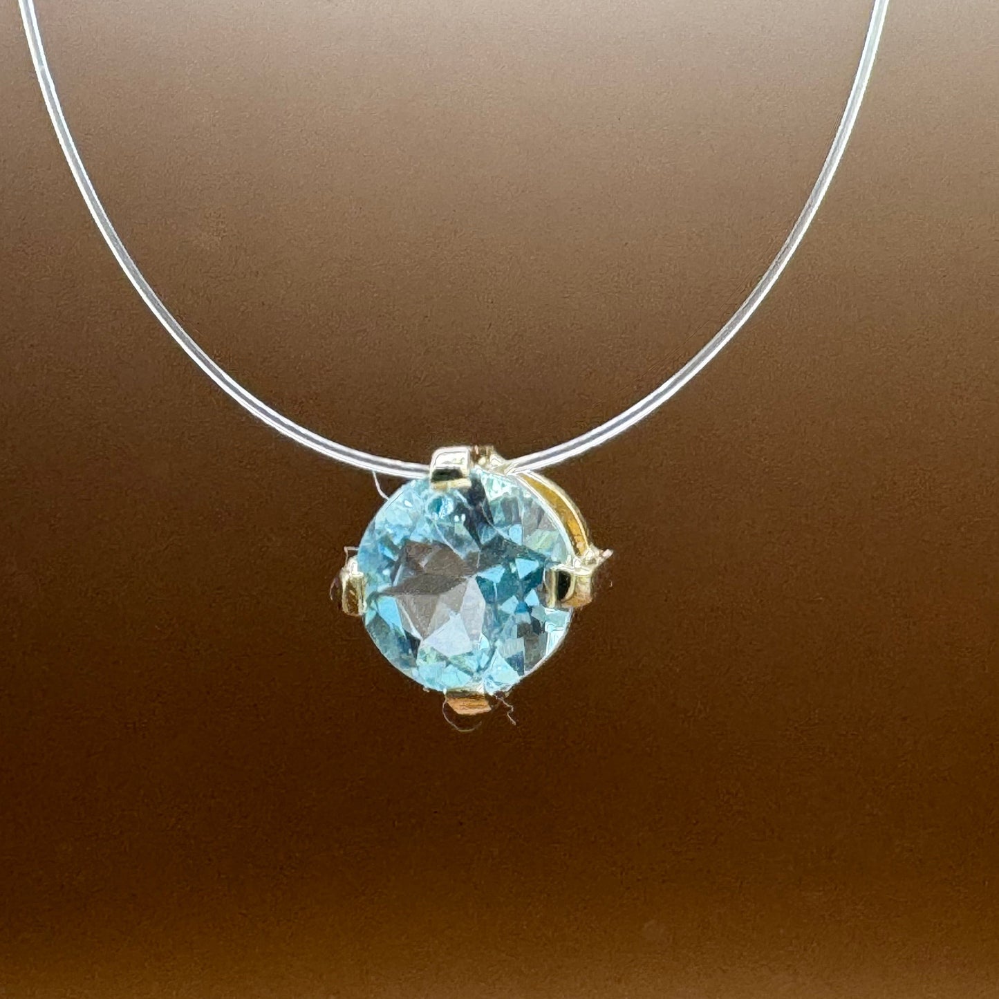 Ponto de Luz Topázio Sky Blue em Ouro 18K