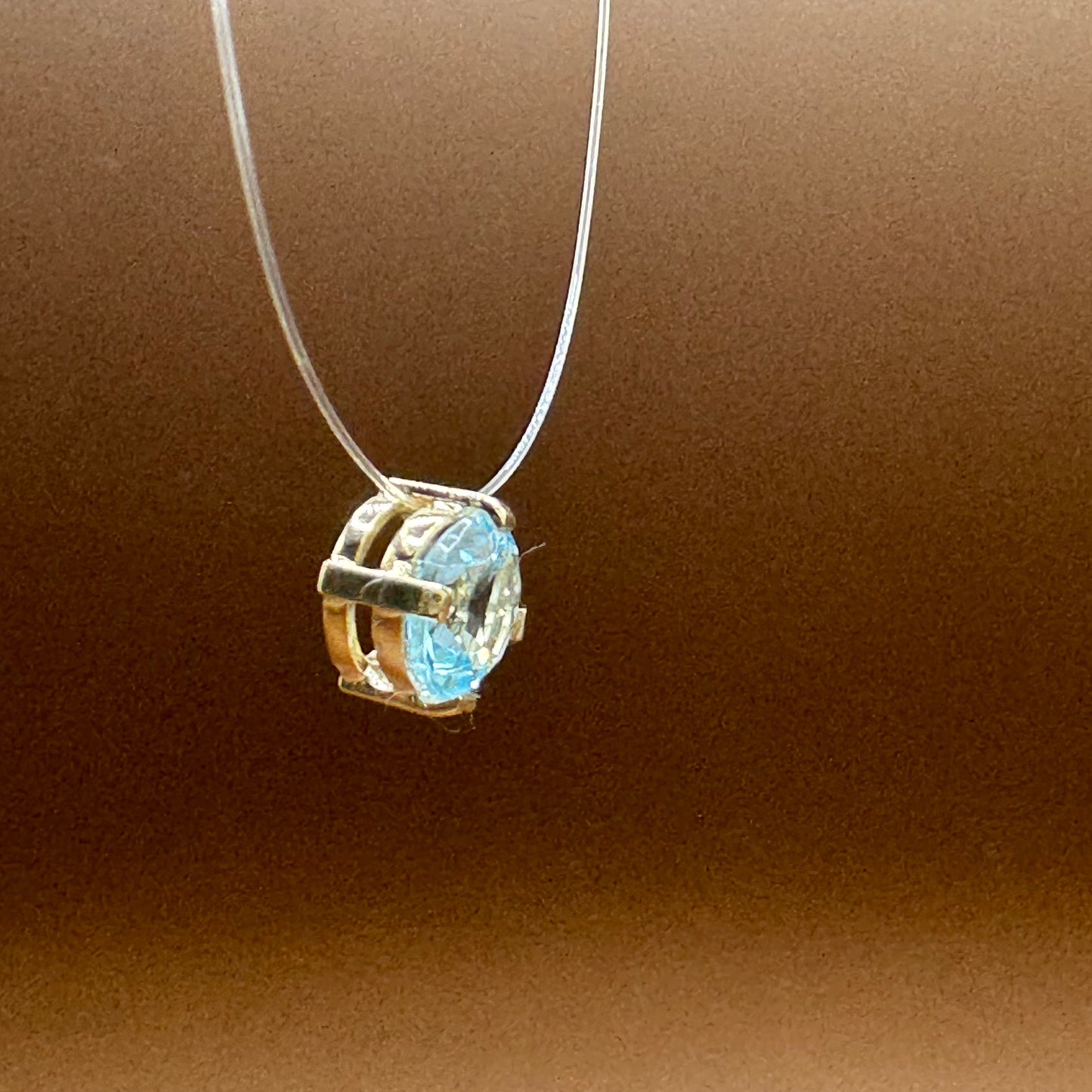 Ponto de Luz Topázio Sky Blue em Ouro 18K