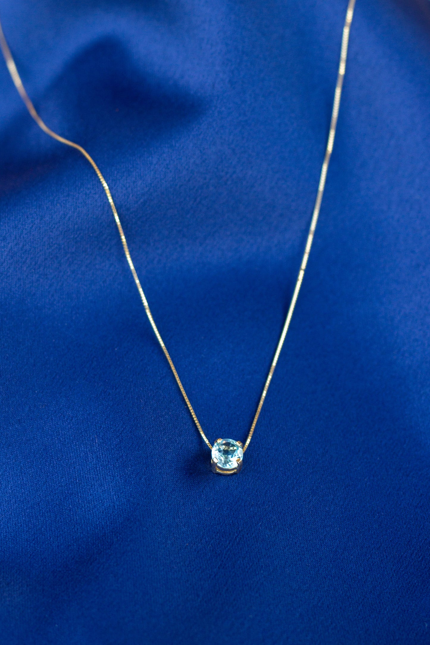 Ponto de Luz Topázio Sky Blue em Ouro 18K