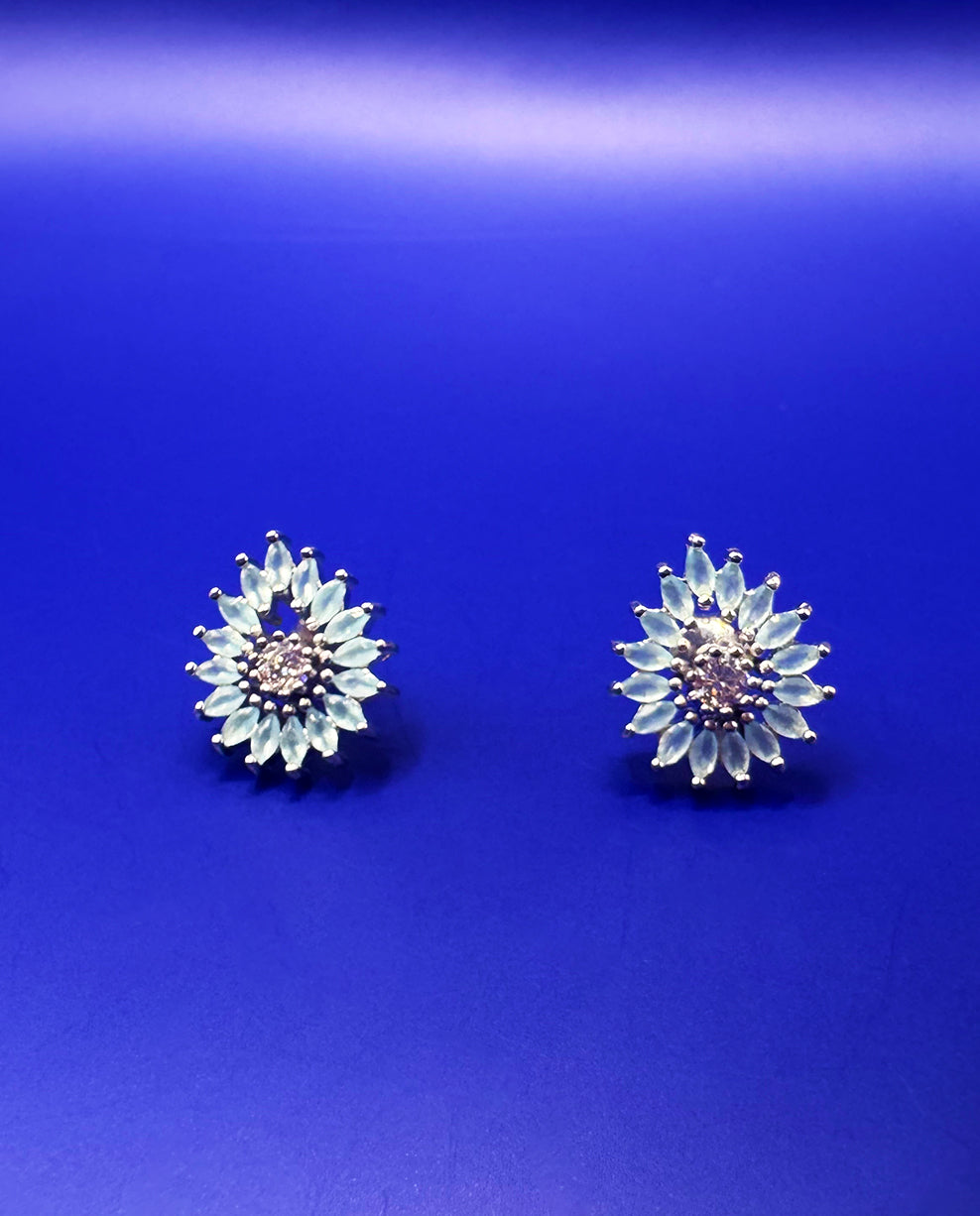 Conjunto em Prata 925 Flor Pétalas com Zircônias Azul Claro e Brancas