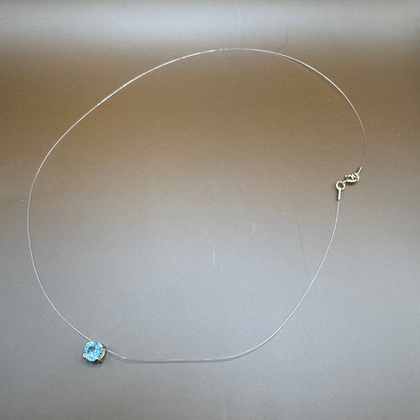 Ponto de Luz Topázio Sky Blue em Ouro 18K